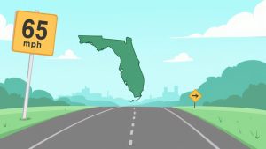 A highway in Florida with speed limit signs and cars driving on a sunny day.