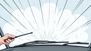 A car windshield with wipers clearing rain, demonstrating effective visibility.