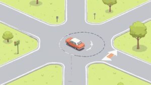 Driver's view of a two-lane roundabout on a clear day with multiple cars navigating it